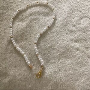 Classic White Pearl Necklace with Gold Accents